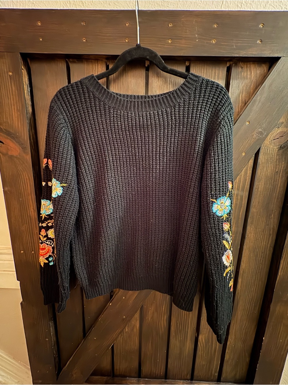 Woven Heart Black Crewneck Sweater with Multicolor Floral Sleeve Embroidery